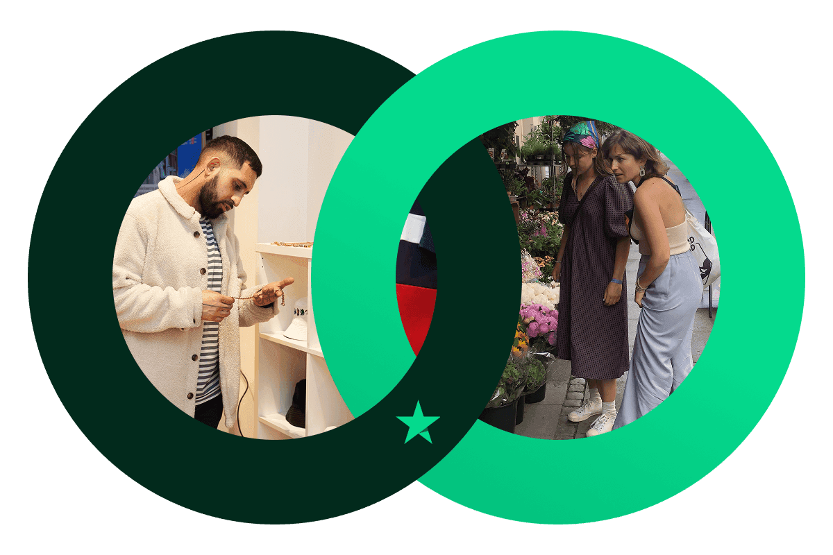 A graphic of a Dark Green and a bright Green circle interlocking, a symbol of trust. The Dark Green one features an image of a man looking at a piece of jewellery and the bright Green one features an image of two women looking at flowers at a flower stall